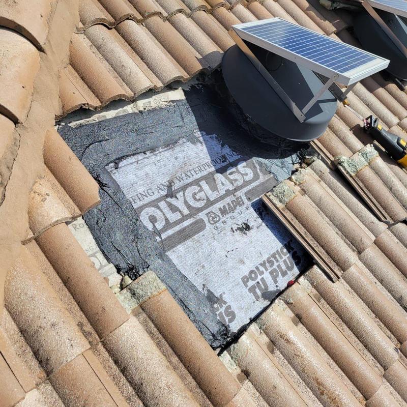 Polyglass underlayment on concrete tile roof with solar vent