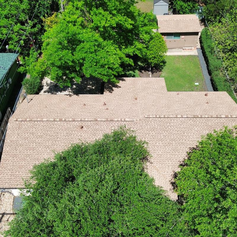 GAF 30-year Shakewood roof with ridge vents and gutters