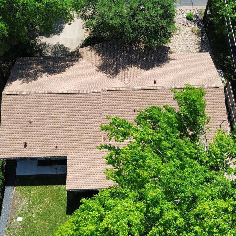 GAF Shakewood roof with ridge vent and new gutters