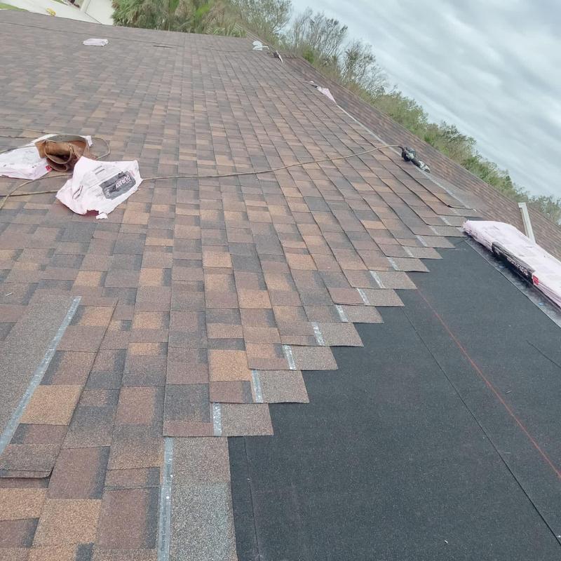 Owens Corning shingle roof installation with underlayment