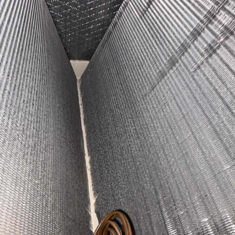 Air conditioner condenser coil cleaning close-up