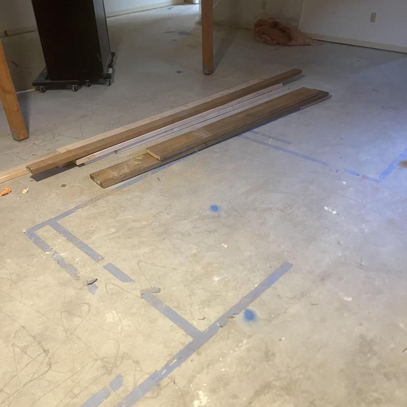 Basement concrete slab with marked sewer line locations