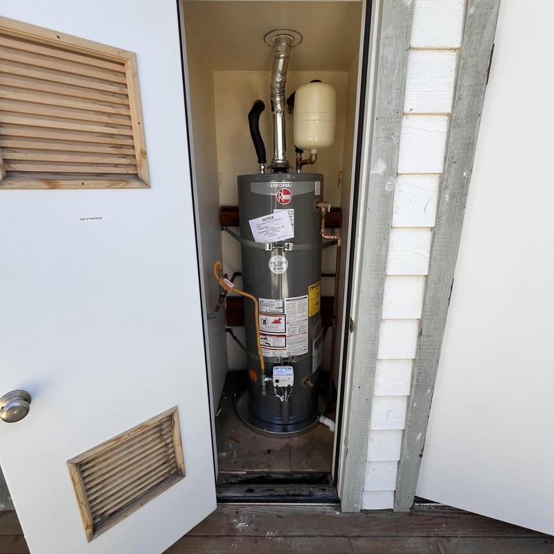 Rheem 40 gallon water heater installed in closet