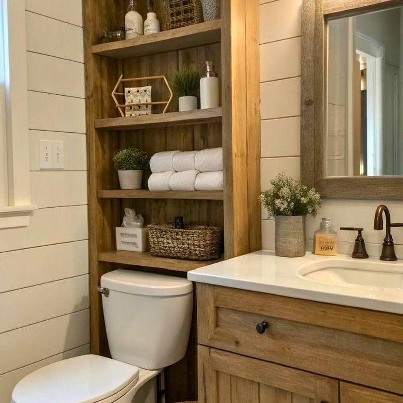 Toilet with wooden shelving and bathroom sink faucet