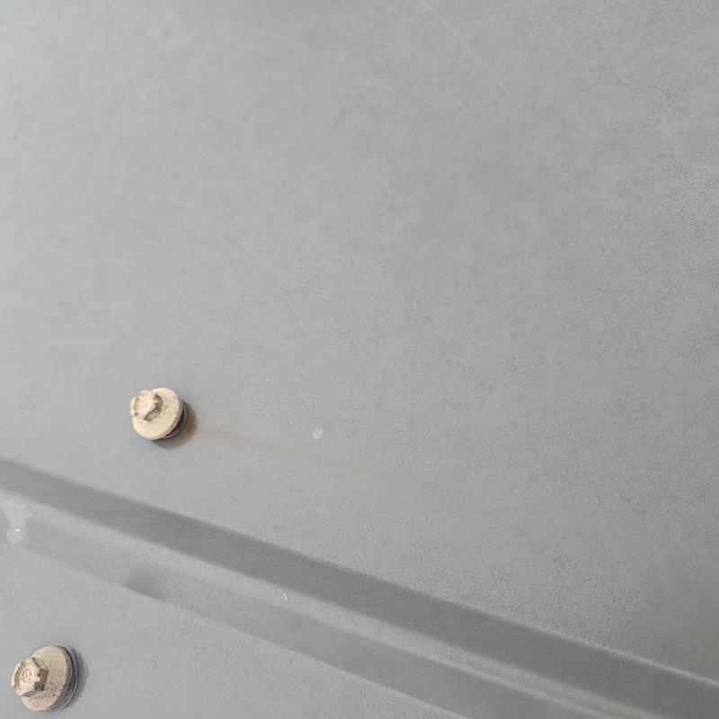 5V crimp metal roof screws showing wear and corrosion