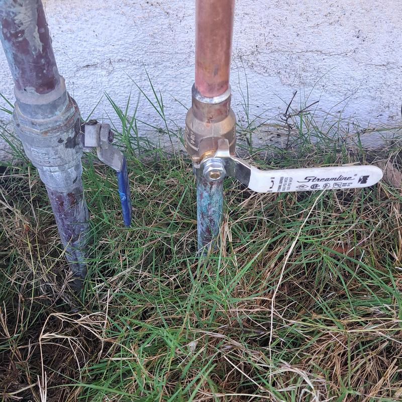 Ball valve on irrigation pipe with copper fittings
