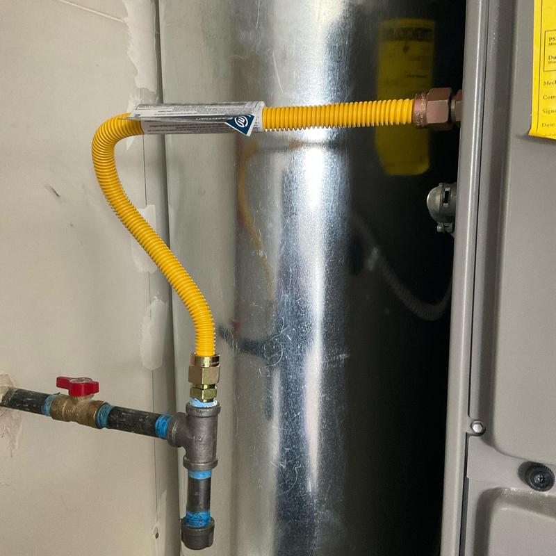Flexible gas line connection to furnace fitting Flexible gas line connection to furnace fitting