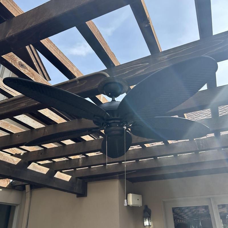 Outdoor rated ceiling fan installation under pergola