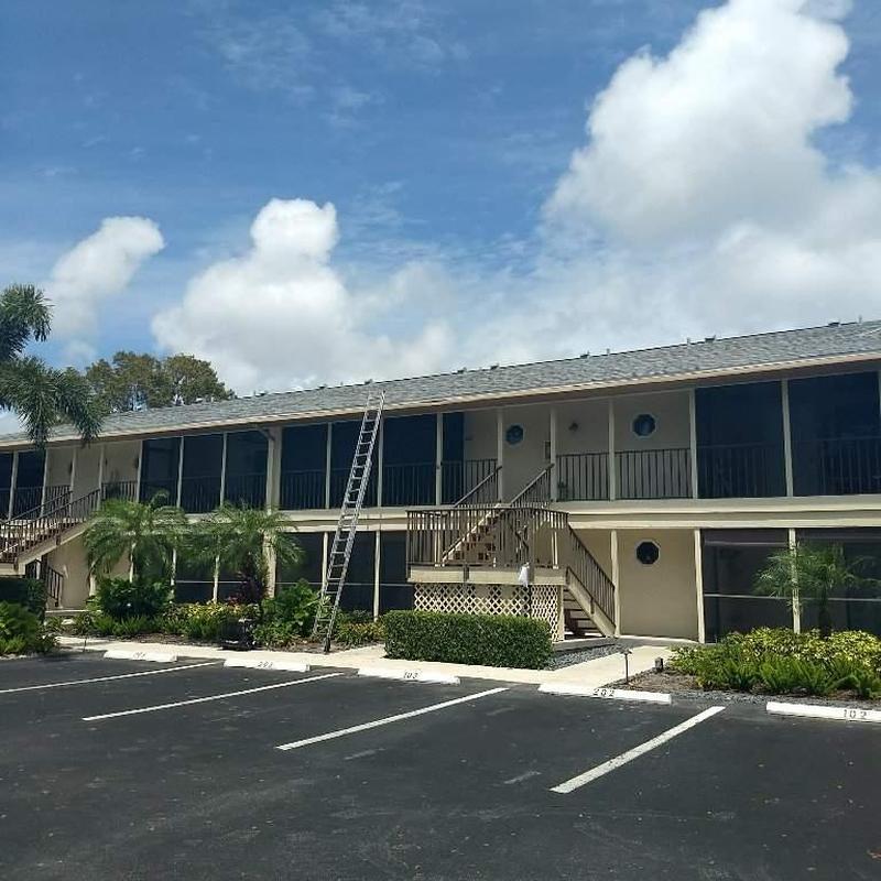 Shingle roof replacement on two-story condo