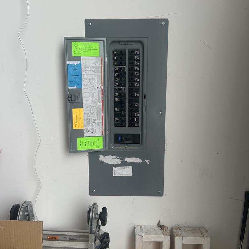 Pool subpanel with circuit breakers and labels