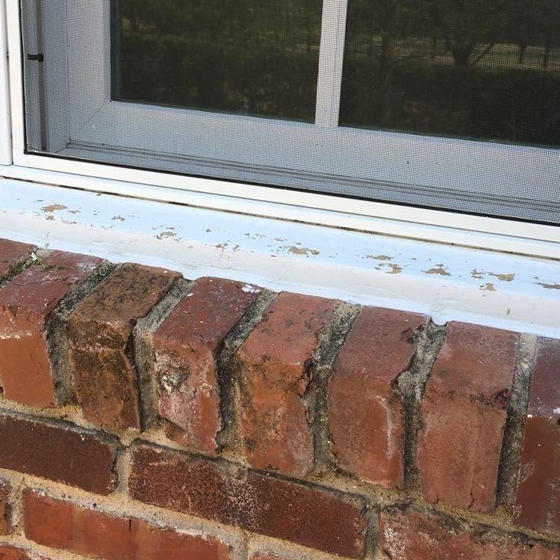 Window wood trim with hail damage and peeling paint Window wood trim with hail damage and peeling paint