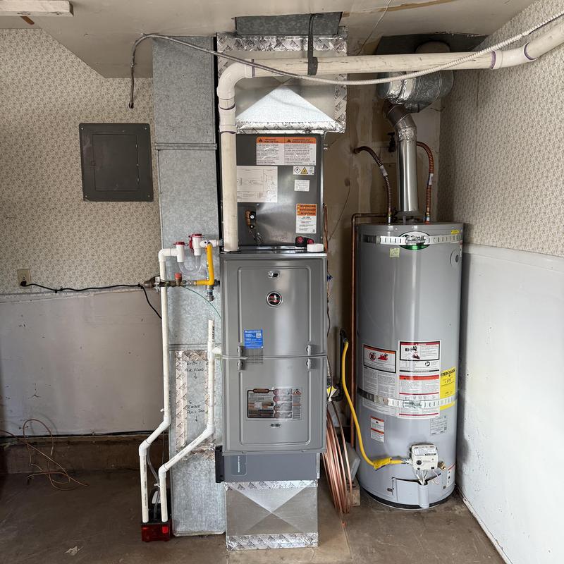 High efficiency gas furnace and water heater installation High efficiency gas furnace and water heater installation
