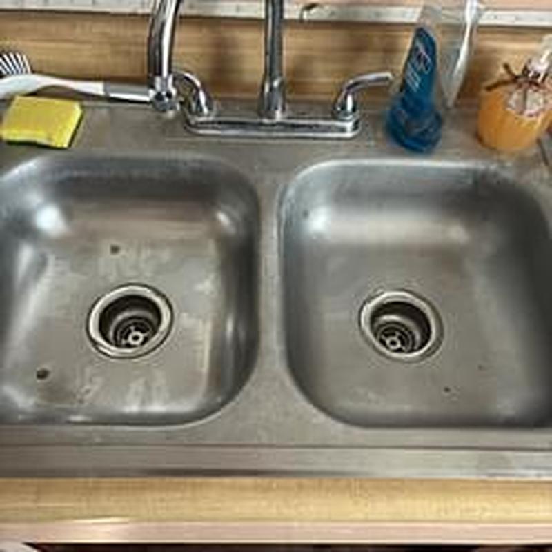 Kitchen sink basket strainers replaced with faucet above