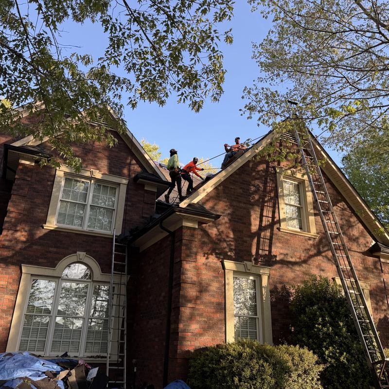 Owens Corning Duration shingle roof installation on steep slope Owens Corning Duration shingle roof installation on steep slope