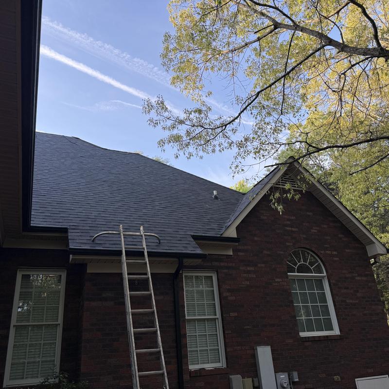 Owens Corning Duration shingle roof installation with ladder Owens Corning Duration shingle roof installation with ladder