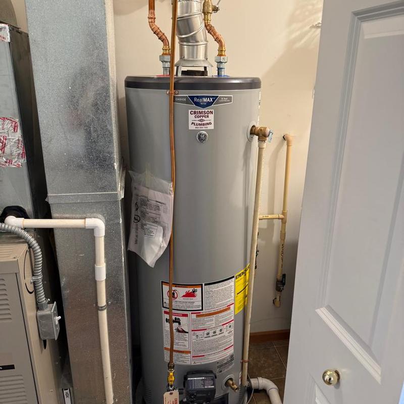 40-gallon electric water heater installation in basement