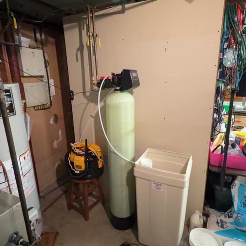 Water softener system with connected filter and brine tank