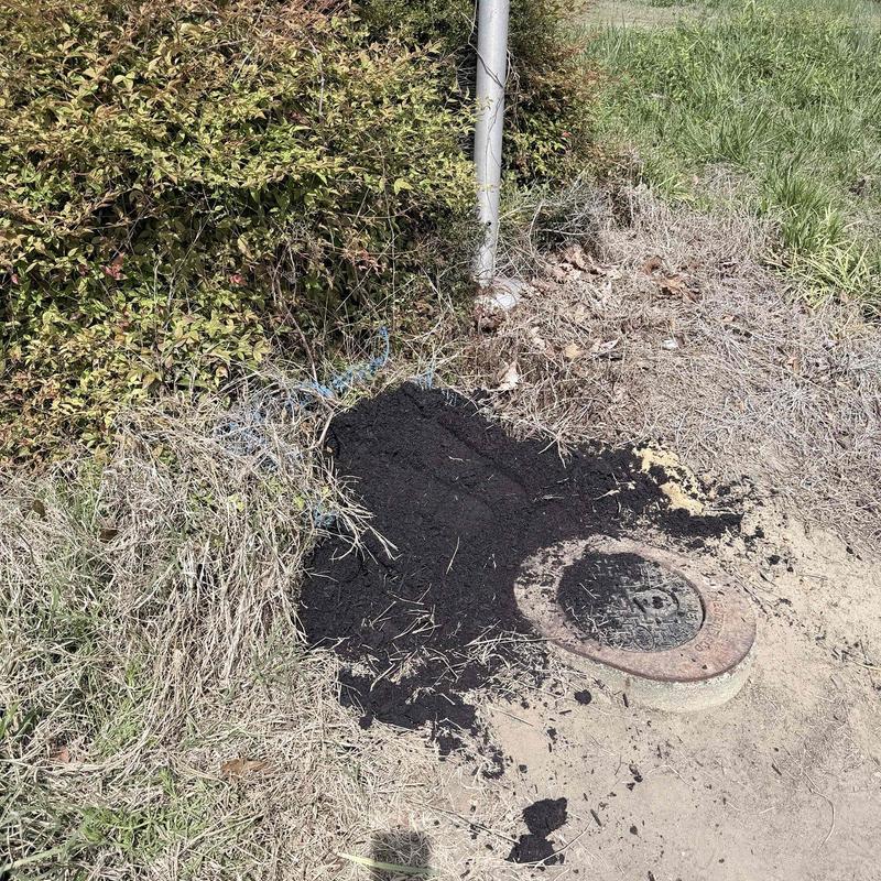 Water meter replacement with soil and mulch backfill
