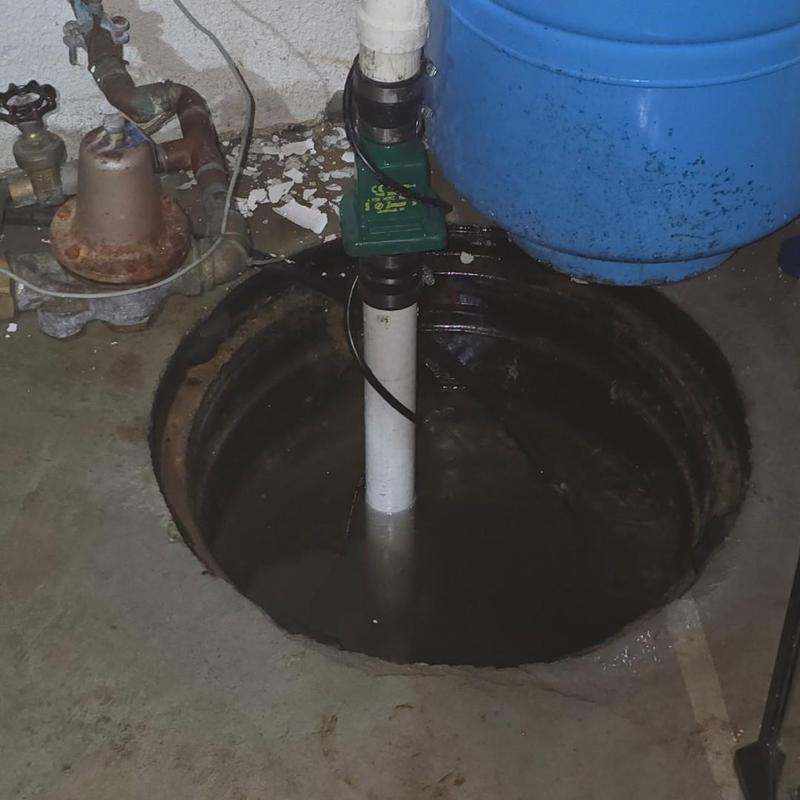 13 HP Zoeller sump pump installed in basement pit