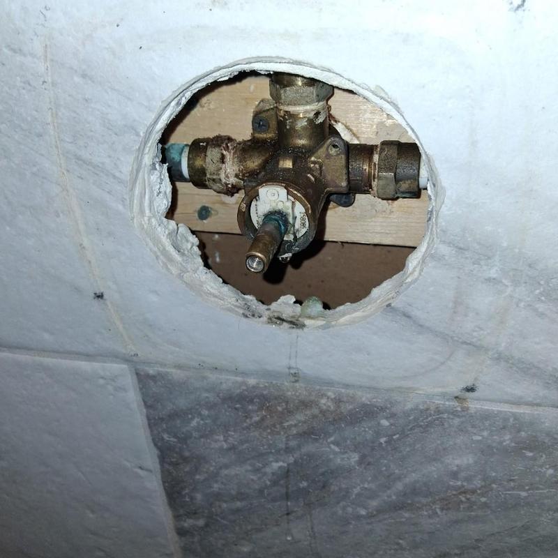 Moen faucet cartridge valve inside tiled wall hole