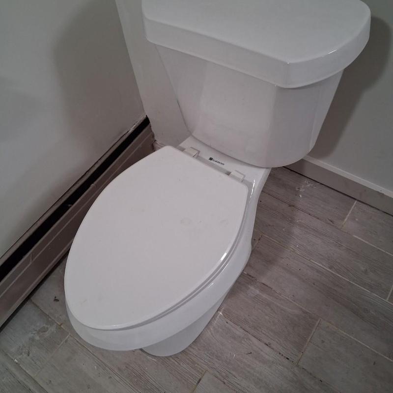 Toilet pull and reset with cable drain cleaning