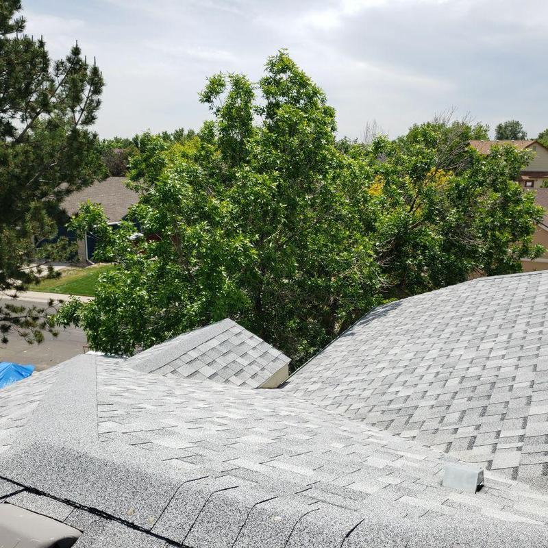 Asphalt shingle roof with resealed pipe jacks and collars