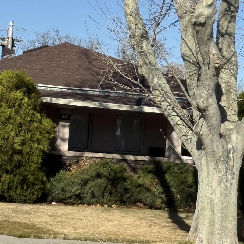 Asphalt shingle roof on residential home exterior