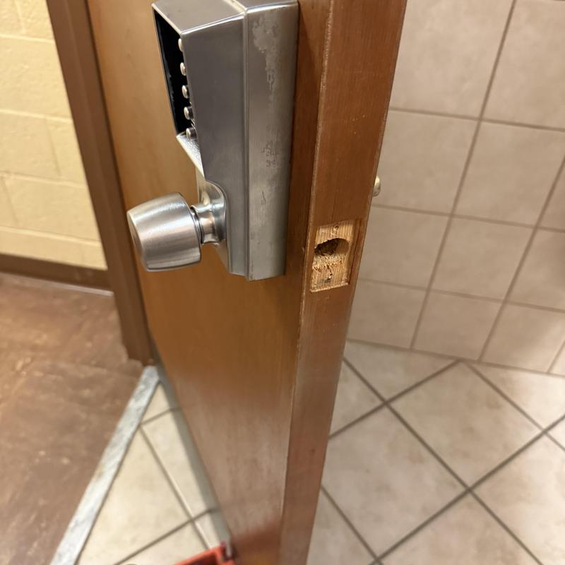 Schlage keypad electronic lock on women's restroom door