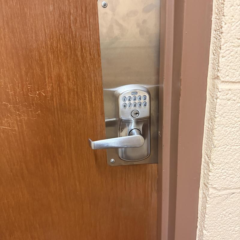 Schlage keypad electronic entry lock on restroom door