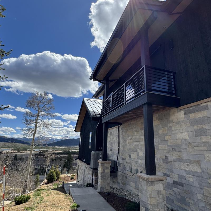 Seamless gutter installation with heat tape and snow fencing