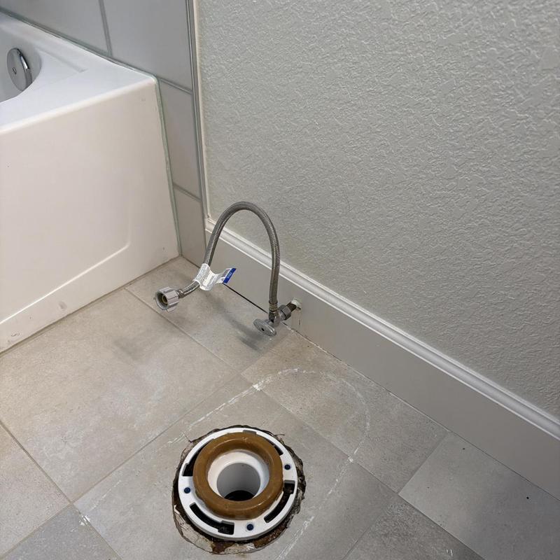 Toilet flange and water supply line installation below grade