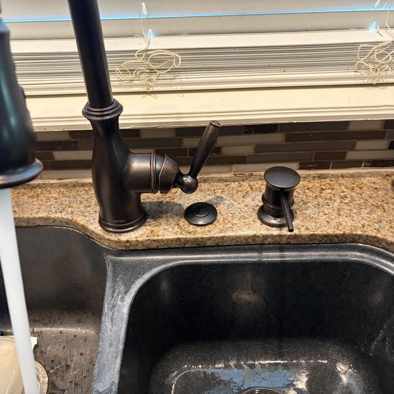 Kitchen faucet and air switch installation on granite countertop Kitchen faucet and air switch installation on granite countertop