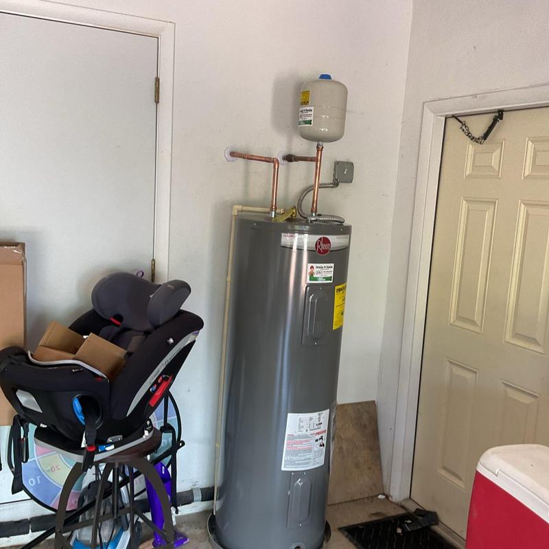 Rheem 50-gallon electric water heater installed indoors