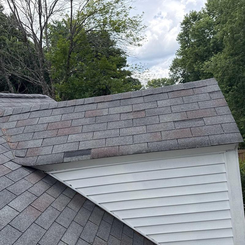 Asphalt roof shingles with hail damage in Franklin TN