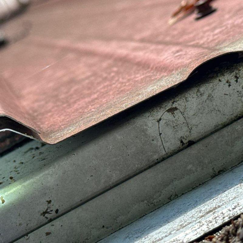 Roof flashing with minor displacement and wear