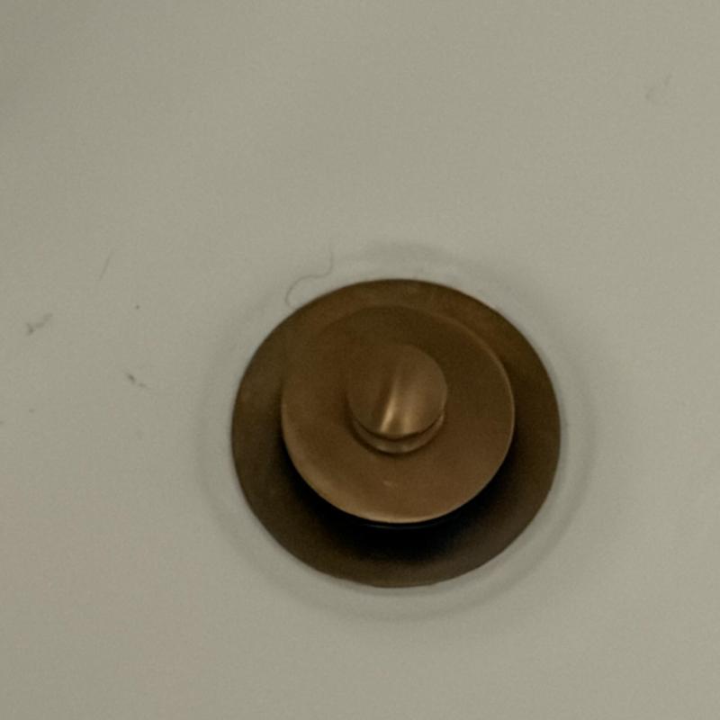 Tub drain stopper installed in bathtub drain Tub drain stopper installed in bathtub drain