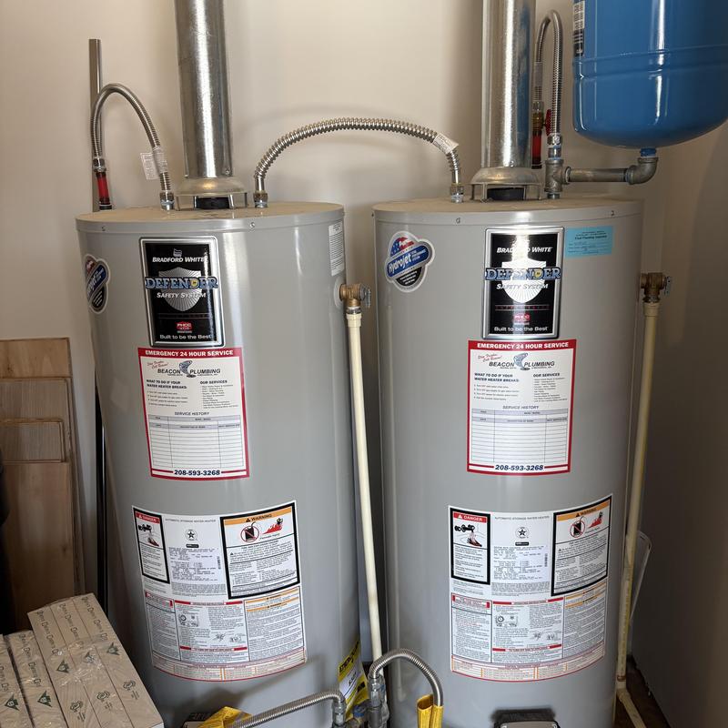 Water heaters with safety system and emergency service labels