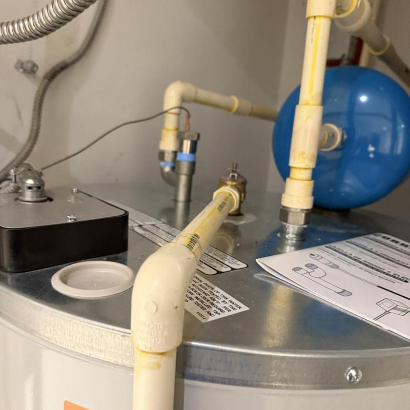 Powered anode rod and water heater pipes installation