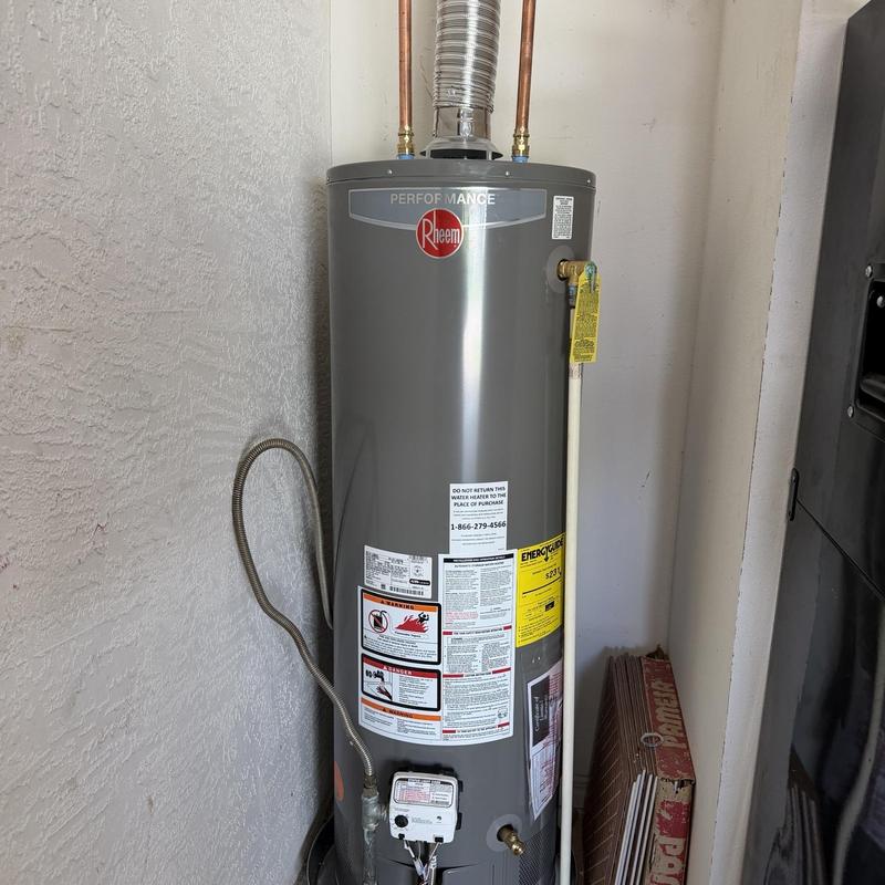Natural gas water heater with new ball valve installed