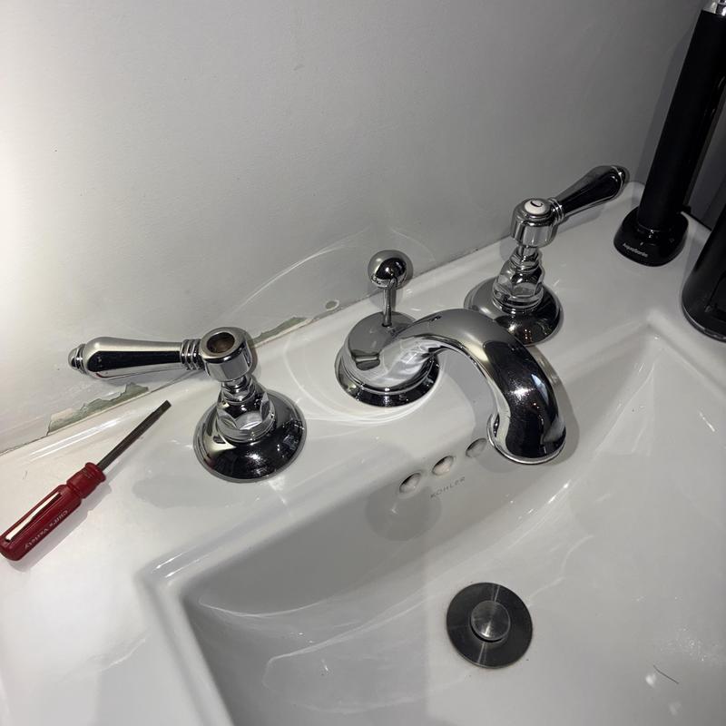 Bathroom sink faucet with handles and screwdriver