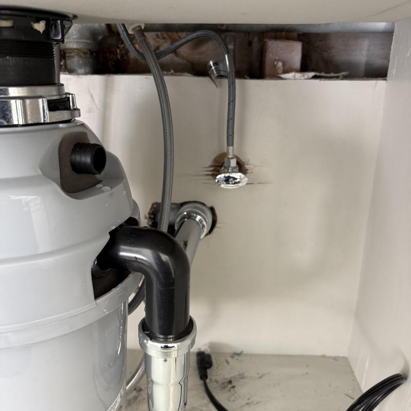 Garbage disposal plumbing with angle stop valve installed