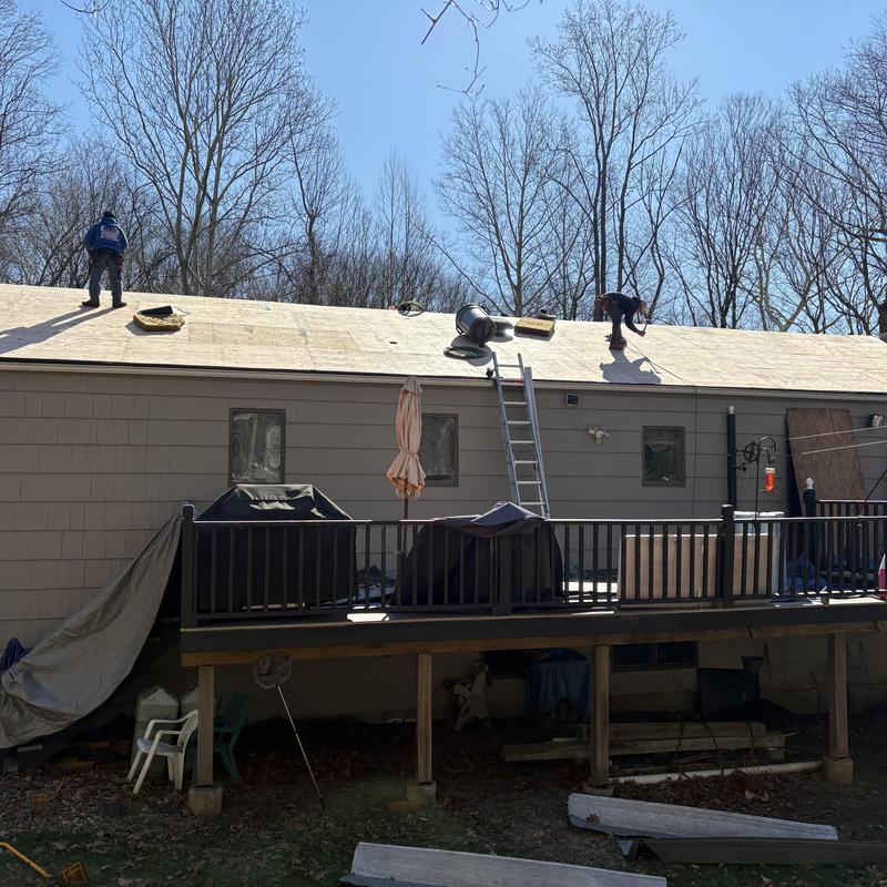 Roof sheathing installation on residential home