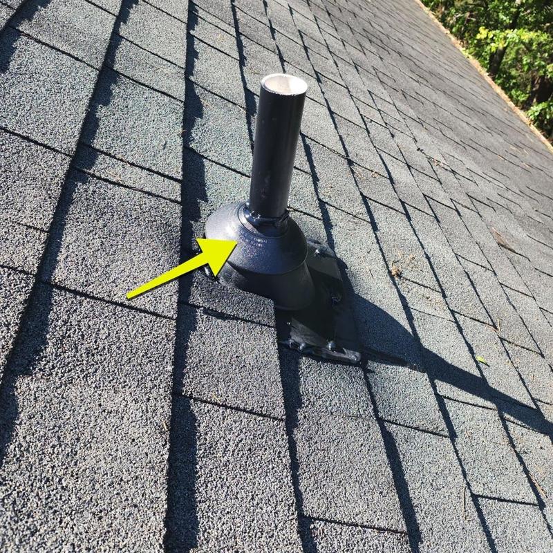 Roof pipe flashing on asphalt shingle roof
