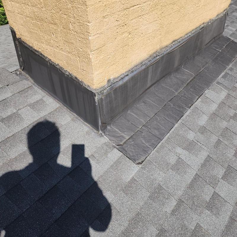 Chimney flashing and roof shingle repair