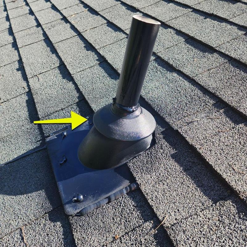 Pipe boot flashing on asphalt shingle roof with sealant