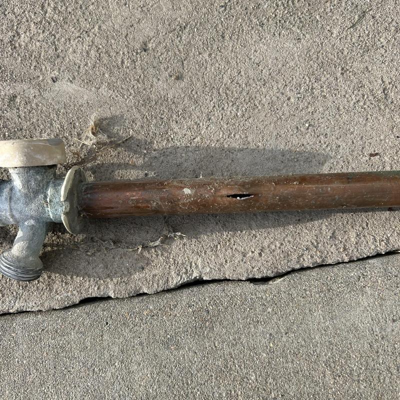 Hose bib with split pipe from freezing damage