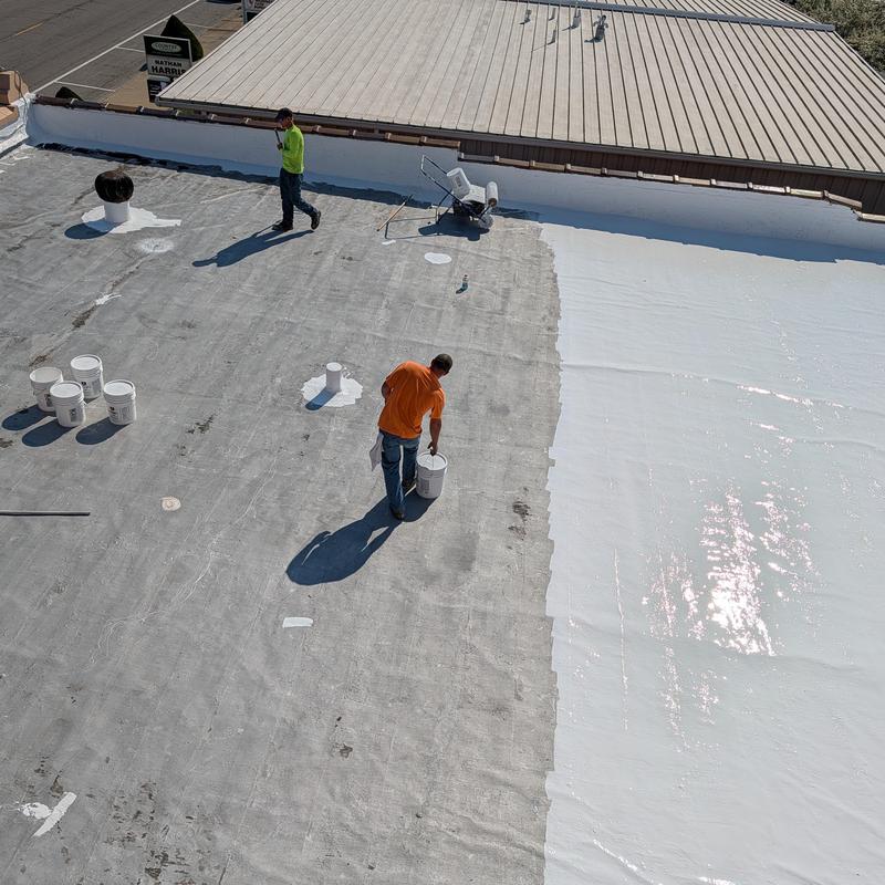 Elastomeric coating on flat commercial roof