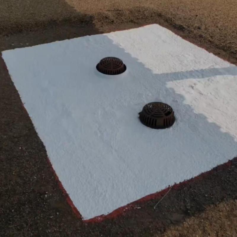 Tar and gravel roof with coated drain covers