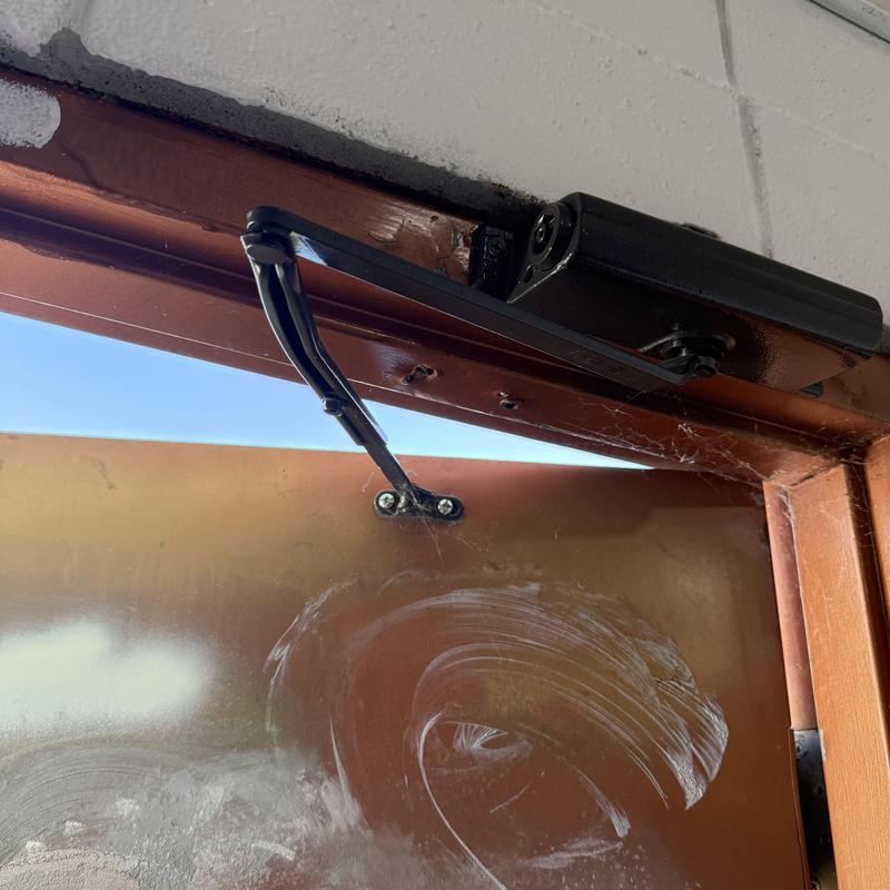 Restroom door closer and arm installation in park