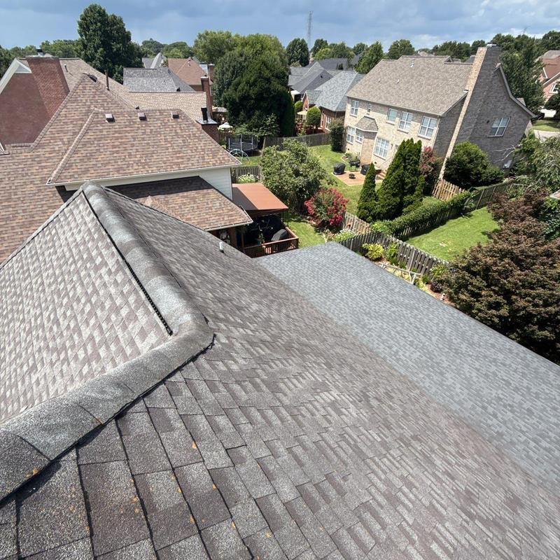 Asphalt shingle roof with hail damage inspection